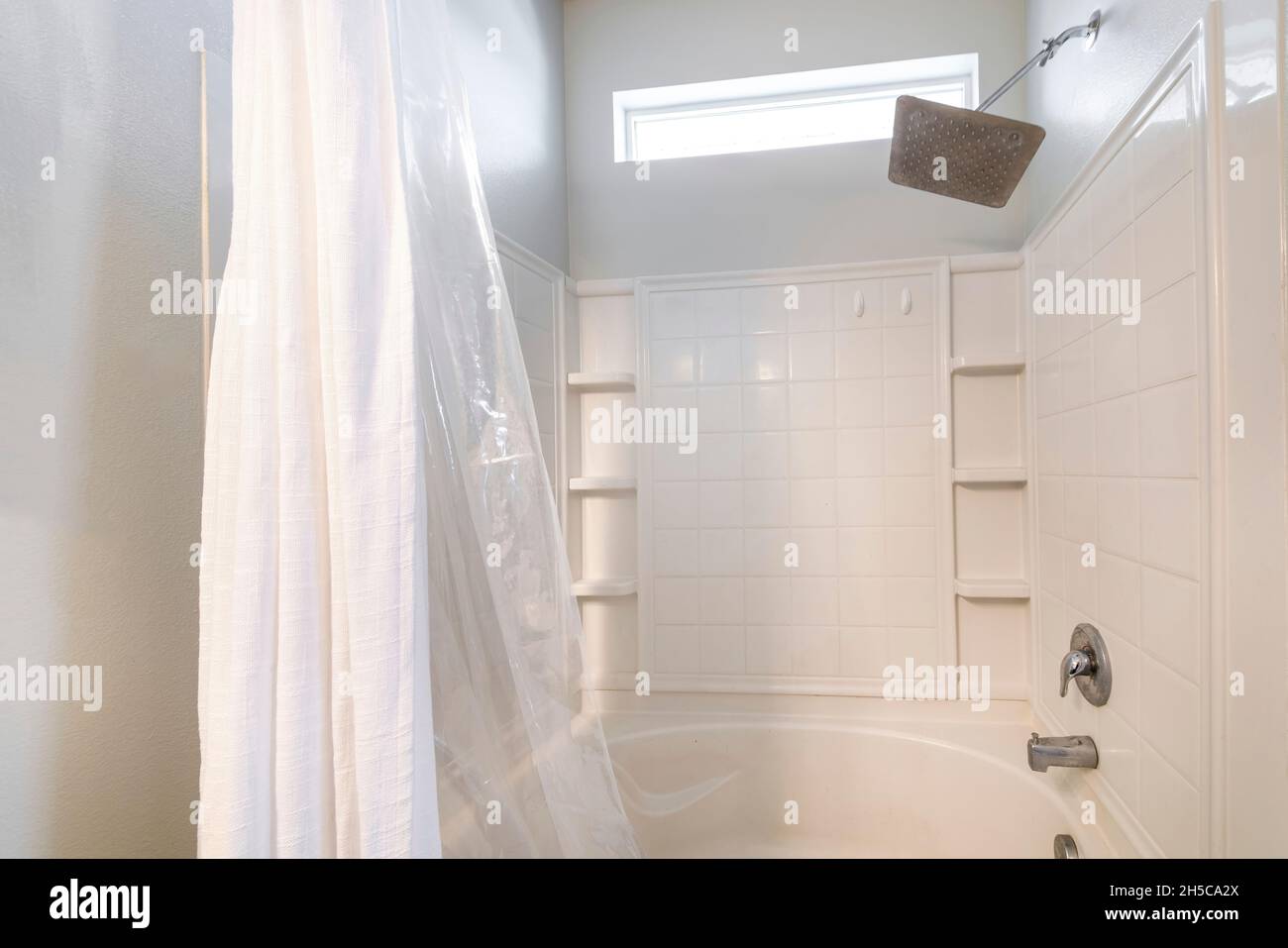 Tubshower combination with stainless wall mounted rainfall shower head