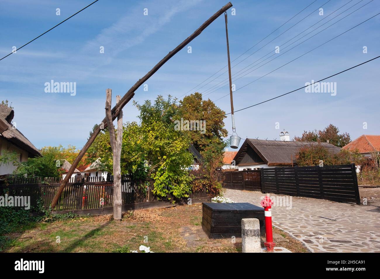 An ancient  wooden T-shaped sweep well in the centre of the village, Hadas,  Mezőkövesd, Hungary Stock Photo