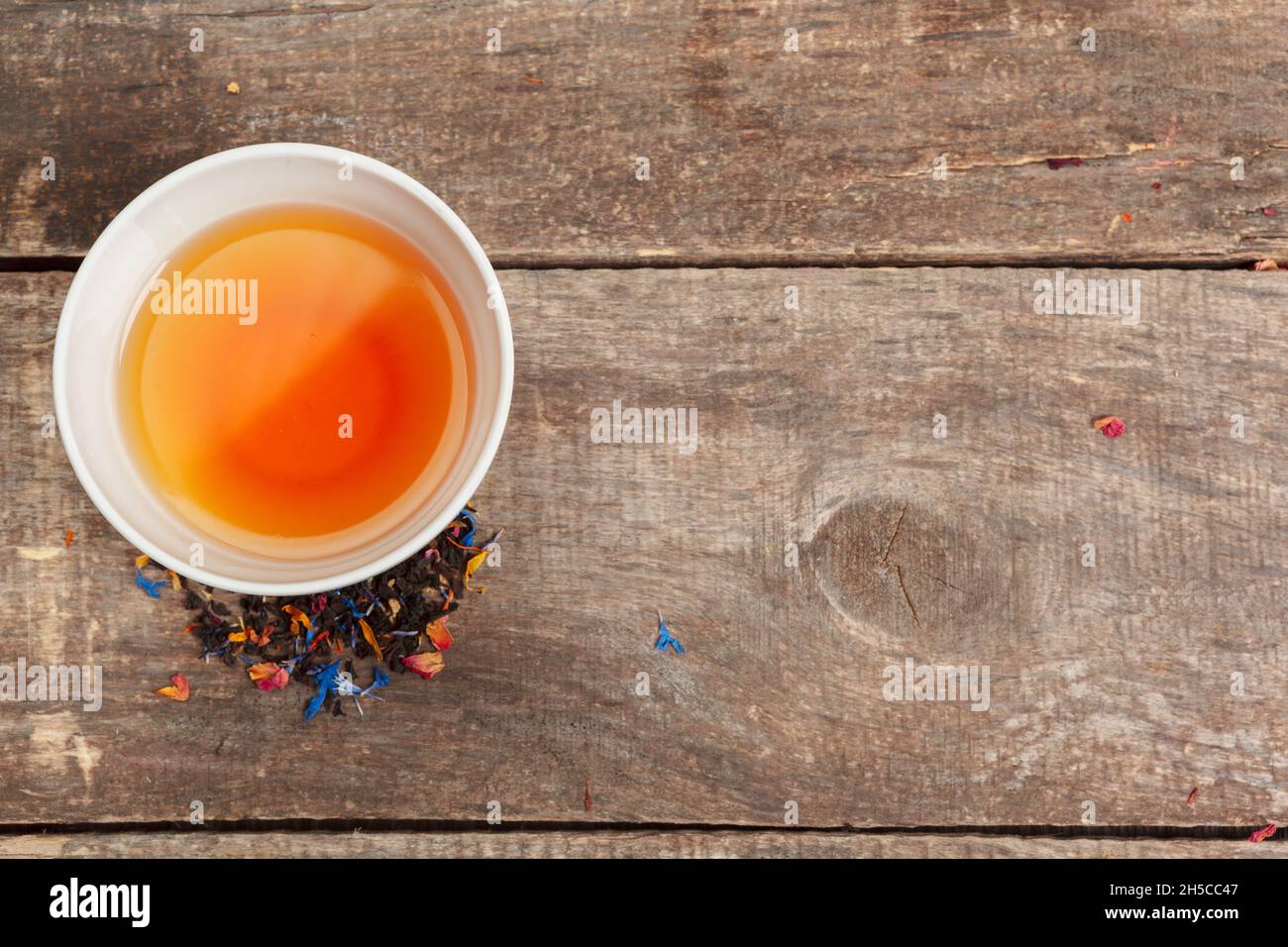 Collection of different teas in cups with tea leaves Stock Photo Alamy