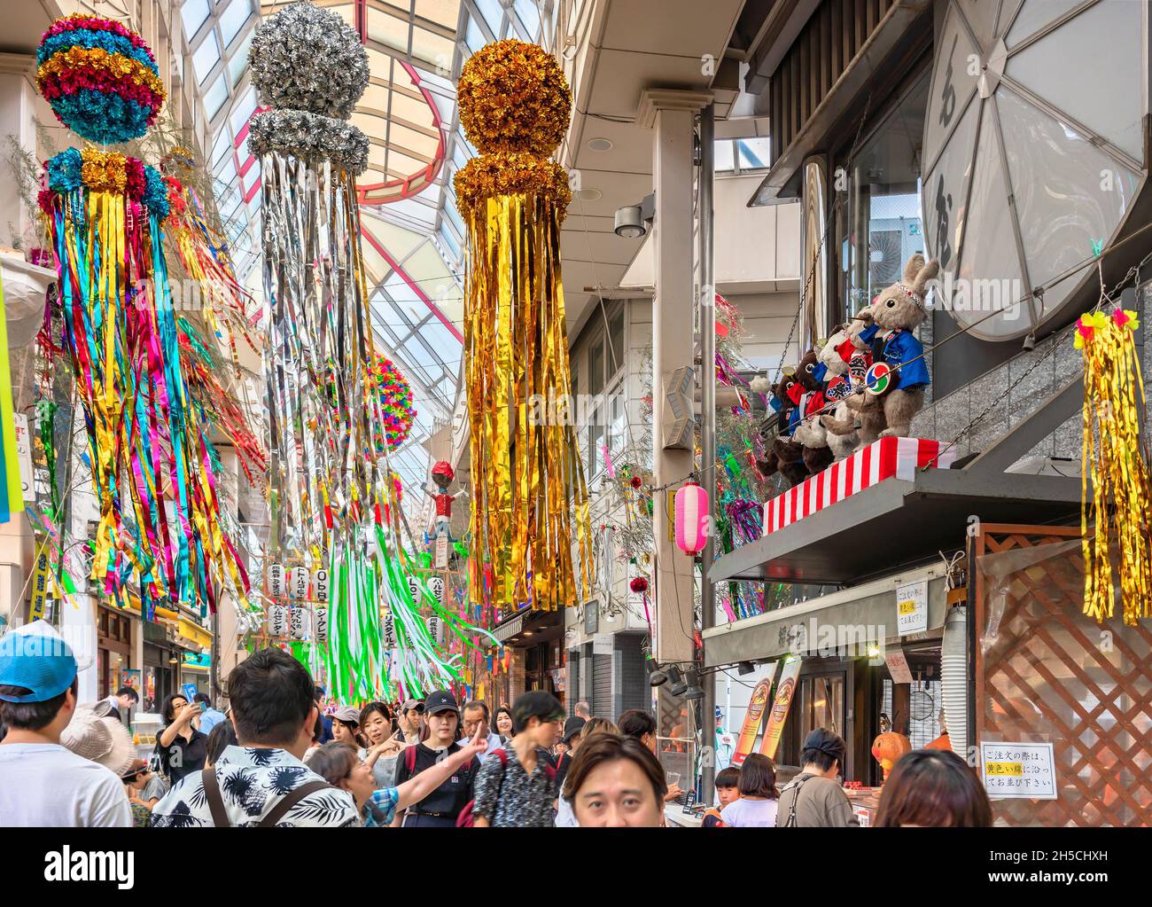 tokyo, japan - august 5 2019: Dazzling fukinagashi decorations hung in the covered arcade of the Asagaya Pearl Center shopping street during Tanabata Stock Photo