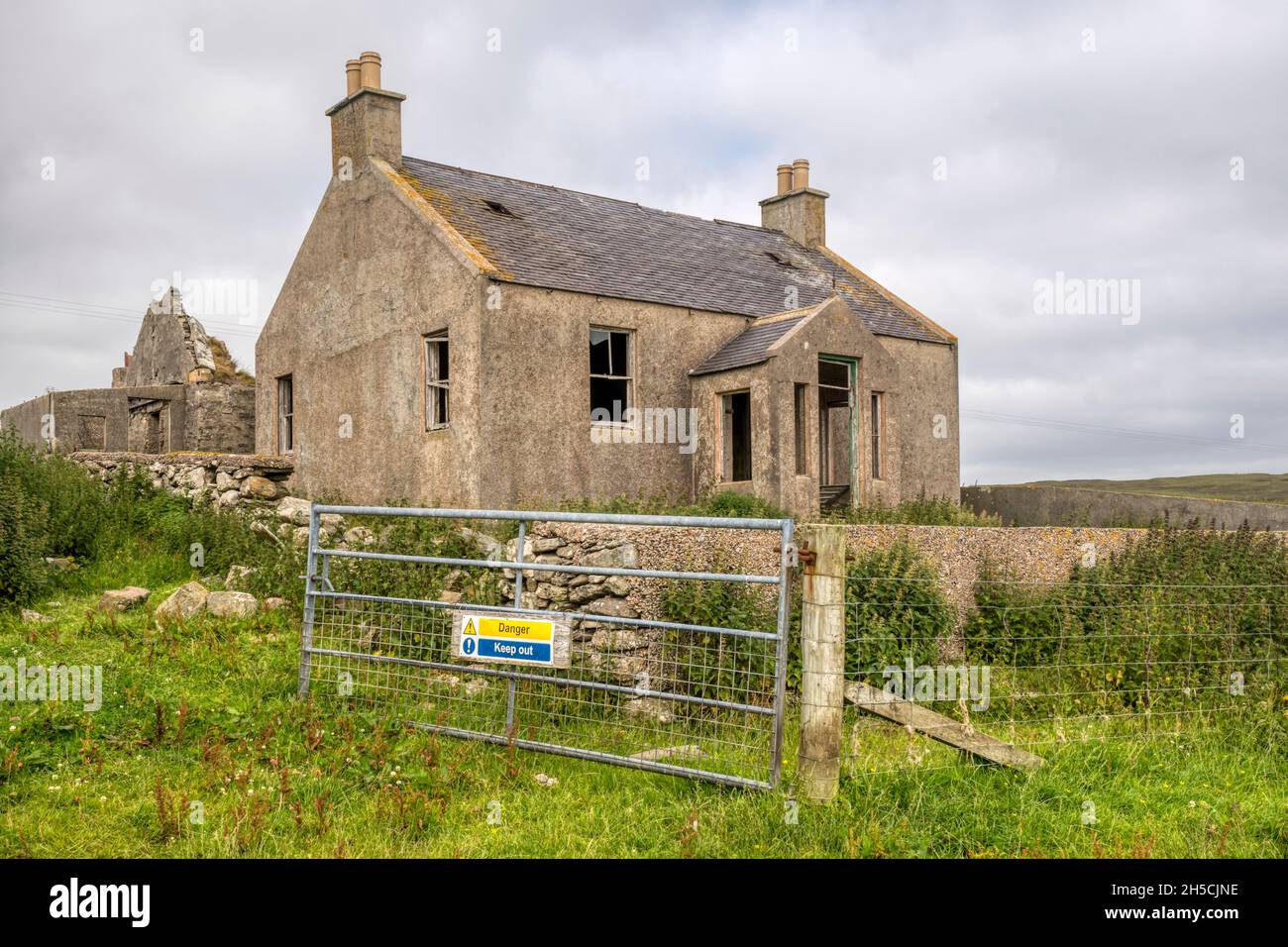 Semi-derelict remote farmstead at Kirkabister on Yell, Shetland Islands. Stock Photo