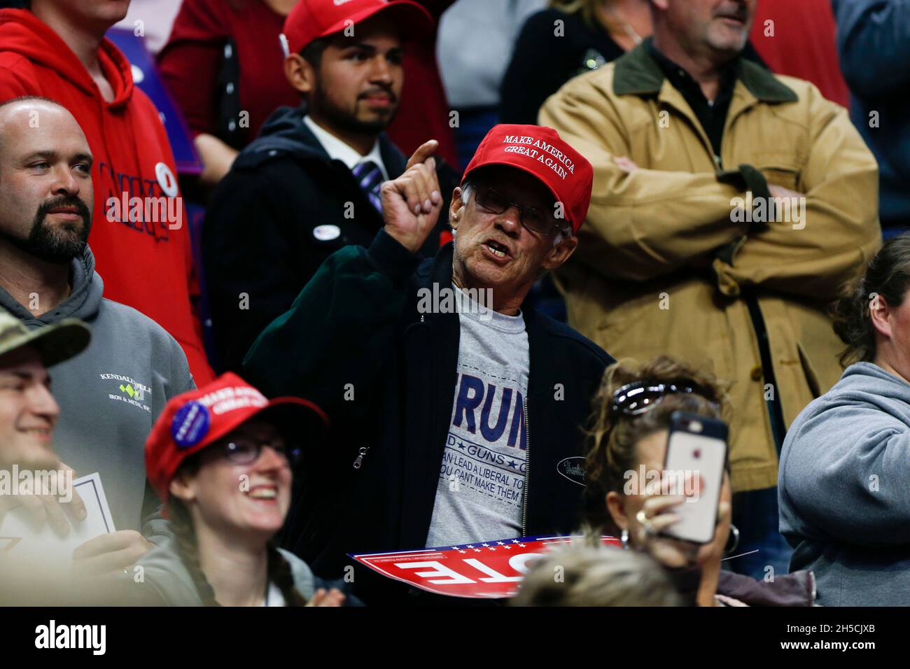 11052018 - Fort Wayne, Indiana, USA: Trump supporters show their anger and disdain towards the media and journalists as United States President Donald J. Trump campaigns for Indiana congressional candidates, including Mike Braun, who is running for senate, during a Make America Great Again! rally at the Allen County War Memorial Coliseum in Fort Wayne, Indiana. Stock Photo
