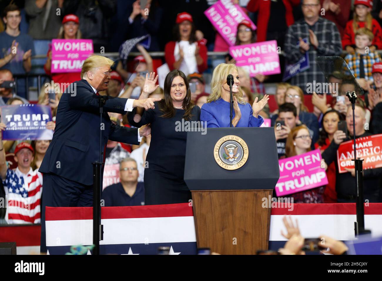 11052018 - Fort Wayne, Indiana, USA: White House Press Secretary Sarah Huckabee Sanders and Kellyanne Elizabeth Conway appear with United States President Donald J. Trump who is campaigning for Indiana congressional candidates, including Mike Braun, who is running for senate, during a Make America Great Again! rally at the Allen County War Memorial Coliseum in Fort Wayne, Indiana. Stock Photo