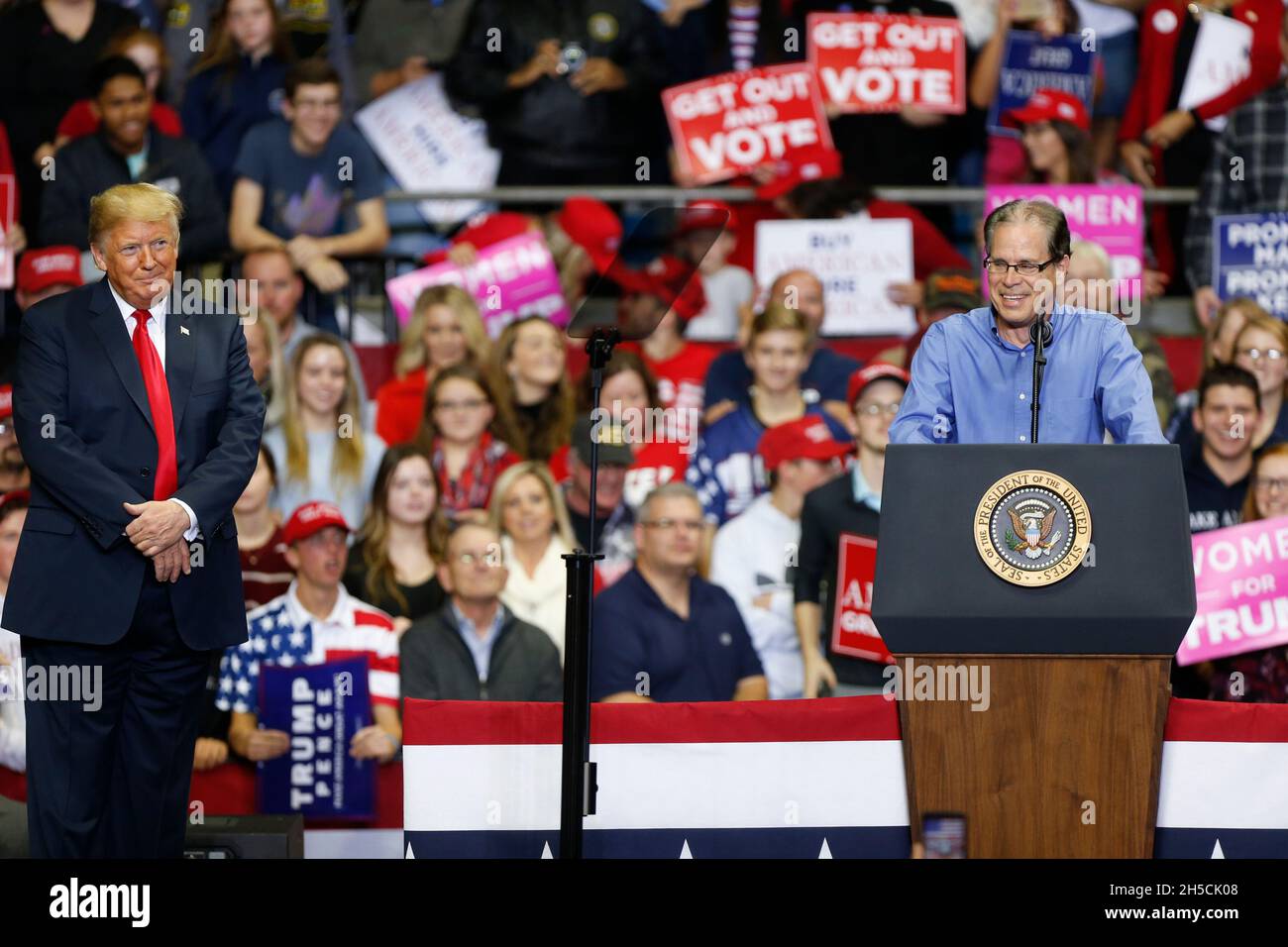 11052018 - Fort Wayne, Indiana, USA: Mike Braun, who is running for senate, appears onstage with United States President Donald J. Trump who is campaigning for Indiana congressional candidates during a Make America Great Again! rally at the Allen County War Memorial Coliseum in Fort Wayne, Indiana. Stock Photo