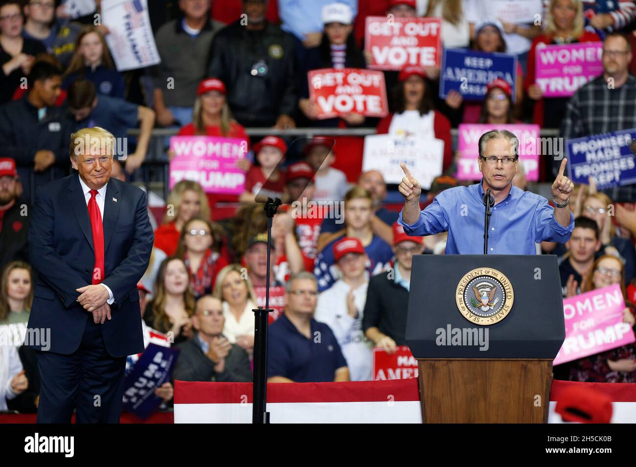 11052018 - Fort Wayne, Indiana, USA: Mike Braun, who is running for senate, appears onstage with United States President Donald J. Trump who is campaigning for Indiana congressional candidates during a Make America Great Again! rally at the Allen County War Memorial Coliseum in Fort Wayne, Indiana. Stock Photo