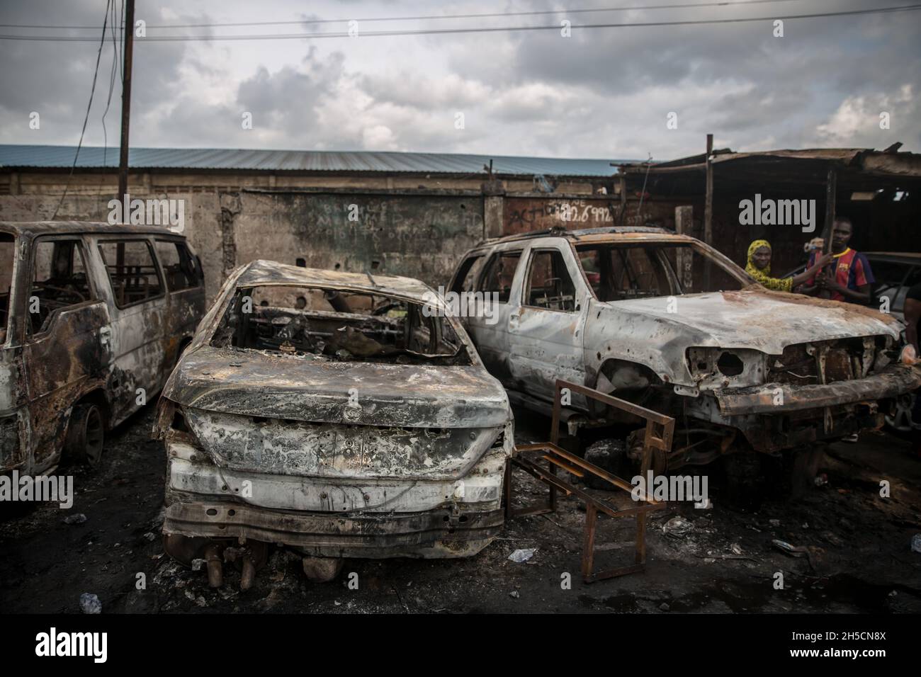 Burnt out vehicles pictured the morning after a fuel tanker exploded in