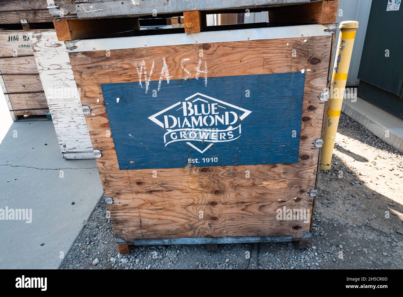 Close up photo of a wooden Blue Diamond Growers crate at the Capay Canyon Ranch in the Central Valley of California. Stock Photo