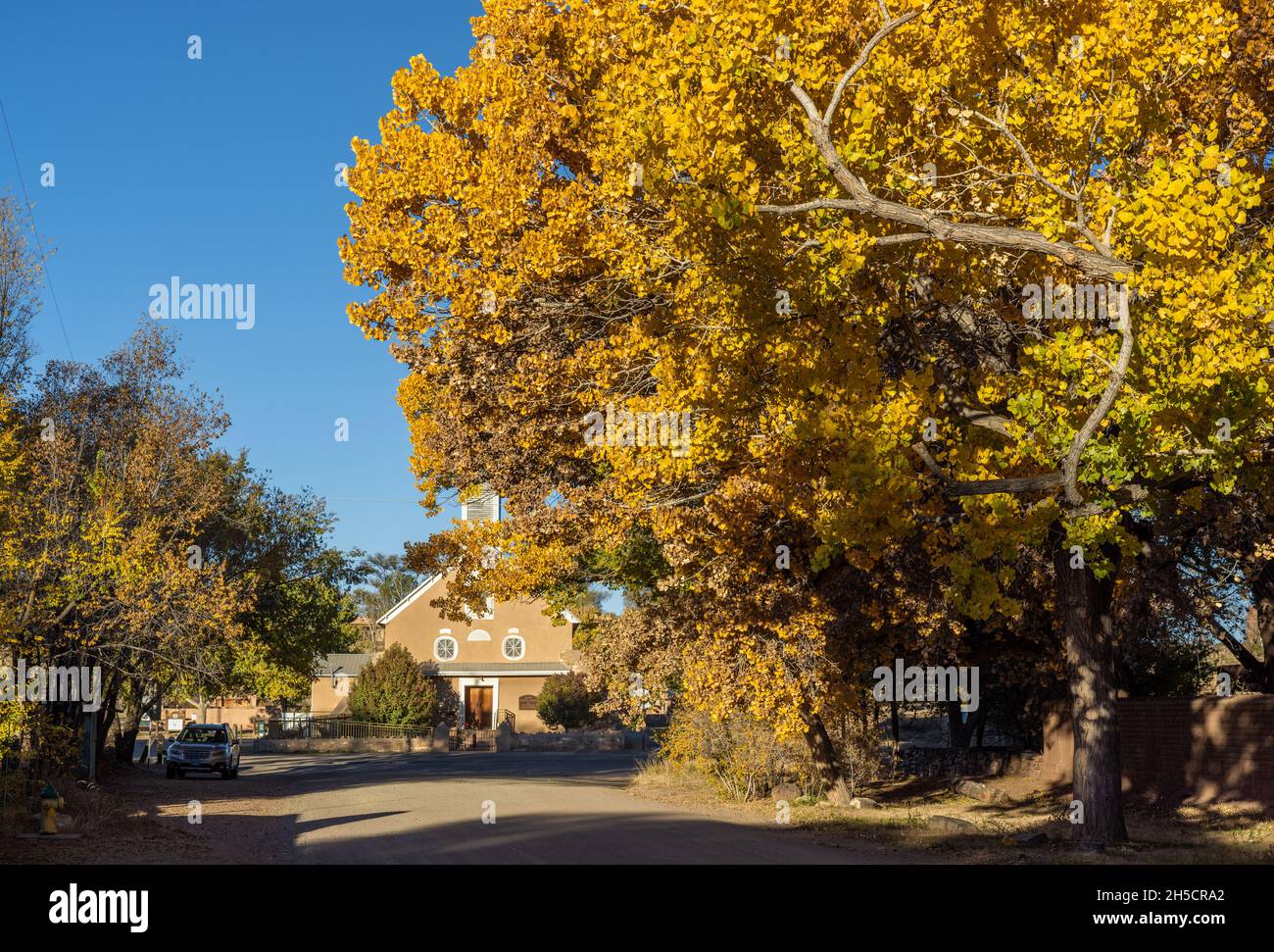 Autumn view of historic Our Lady of the Remedies Church, Galisteo, NM Stock Photo
