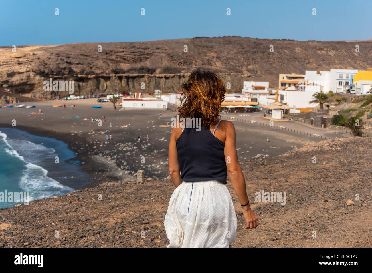 Caucasian female walking on beach hi-res stock photography and images ...