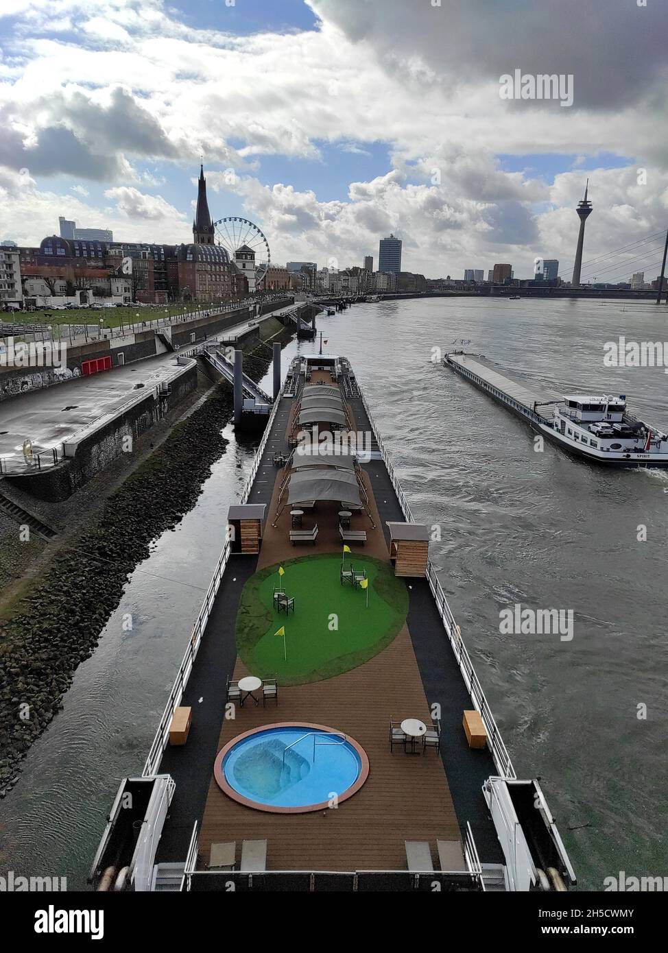 river cruise with pool and golf course on the Rhine, Germany, North Rhine-Westphalia, Lower Rhine, Dusseldorf Stock Photo