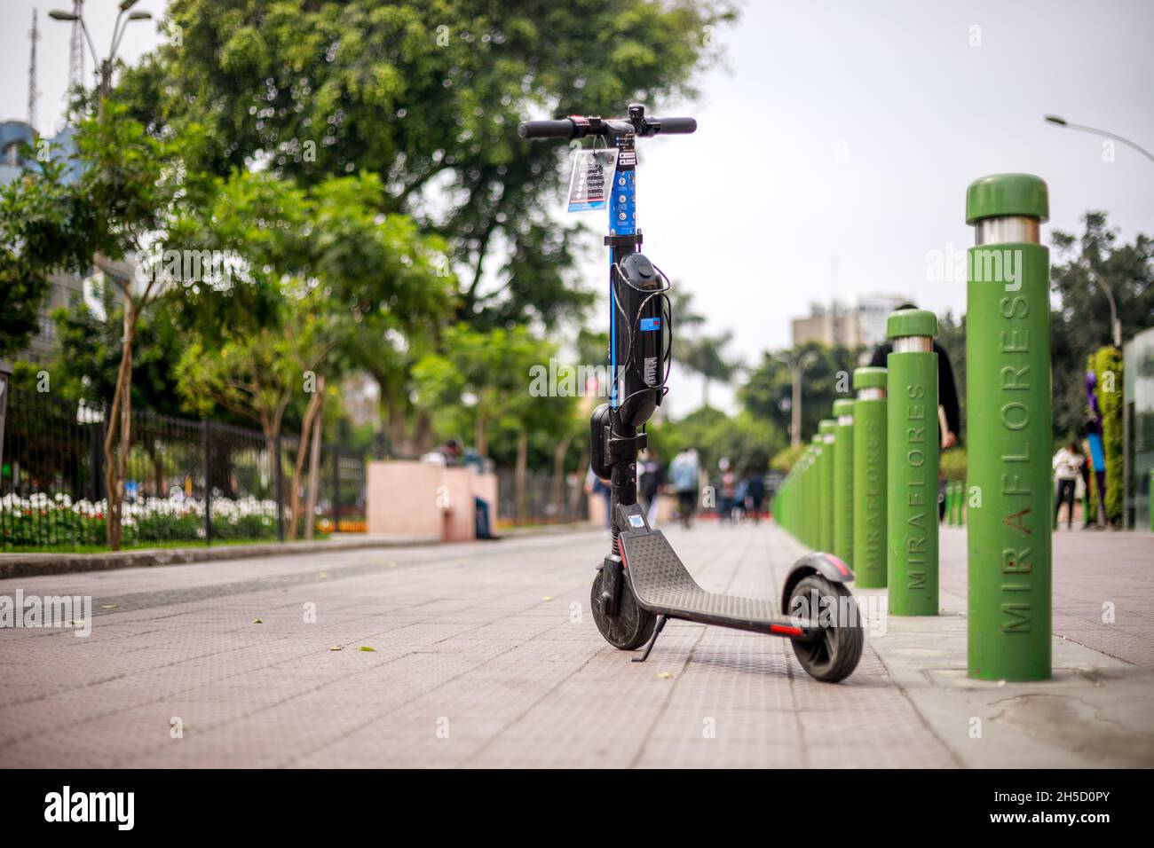 Modern electric scooter stationed in Miraflores District from Lima, Peru Stock Photo