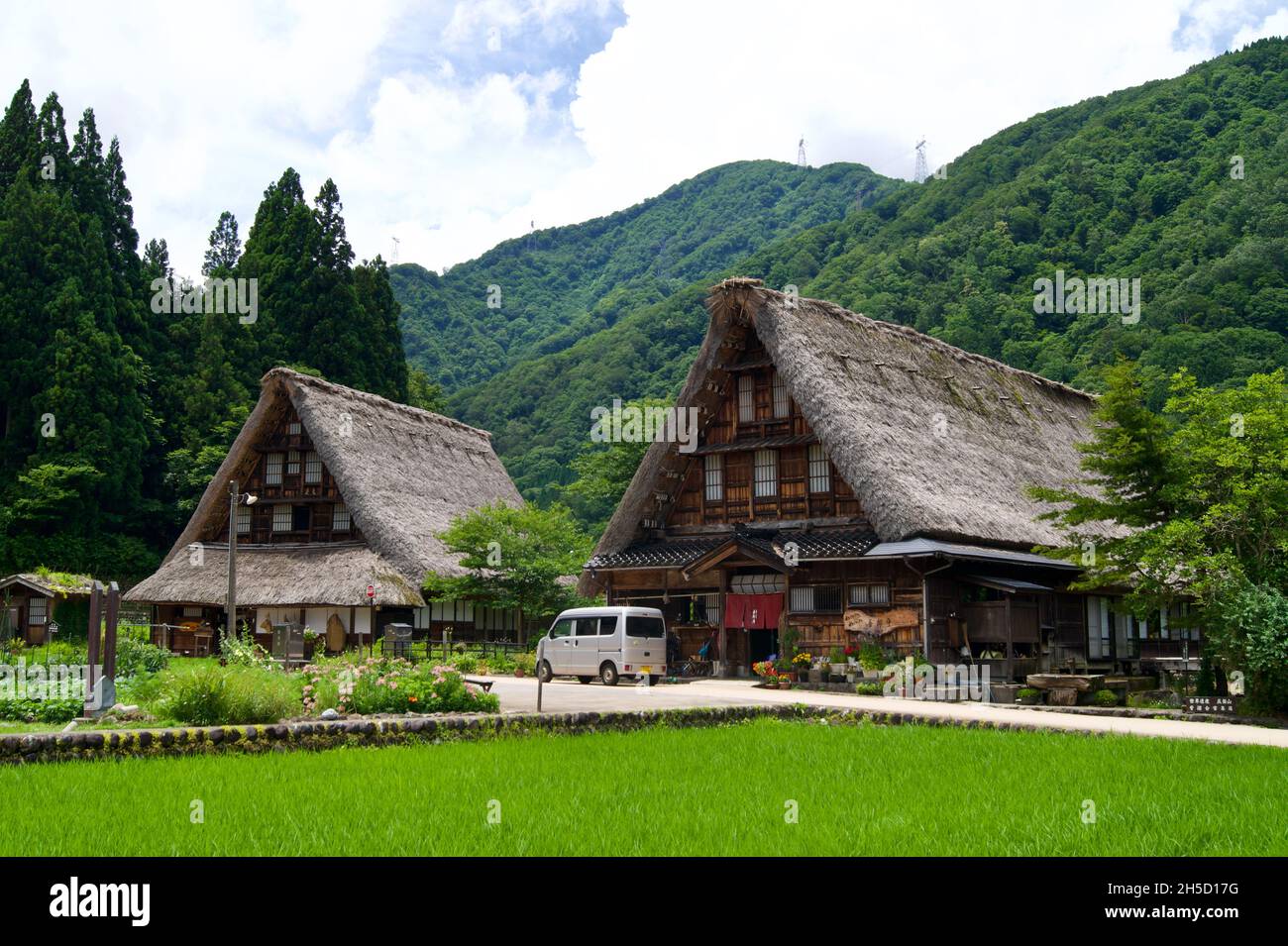 View of thatch roof houses among the amazing nature in Nanto, Japan Stock Photo