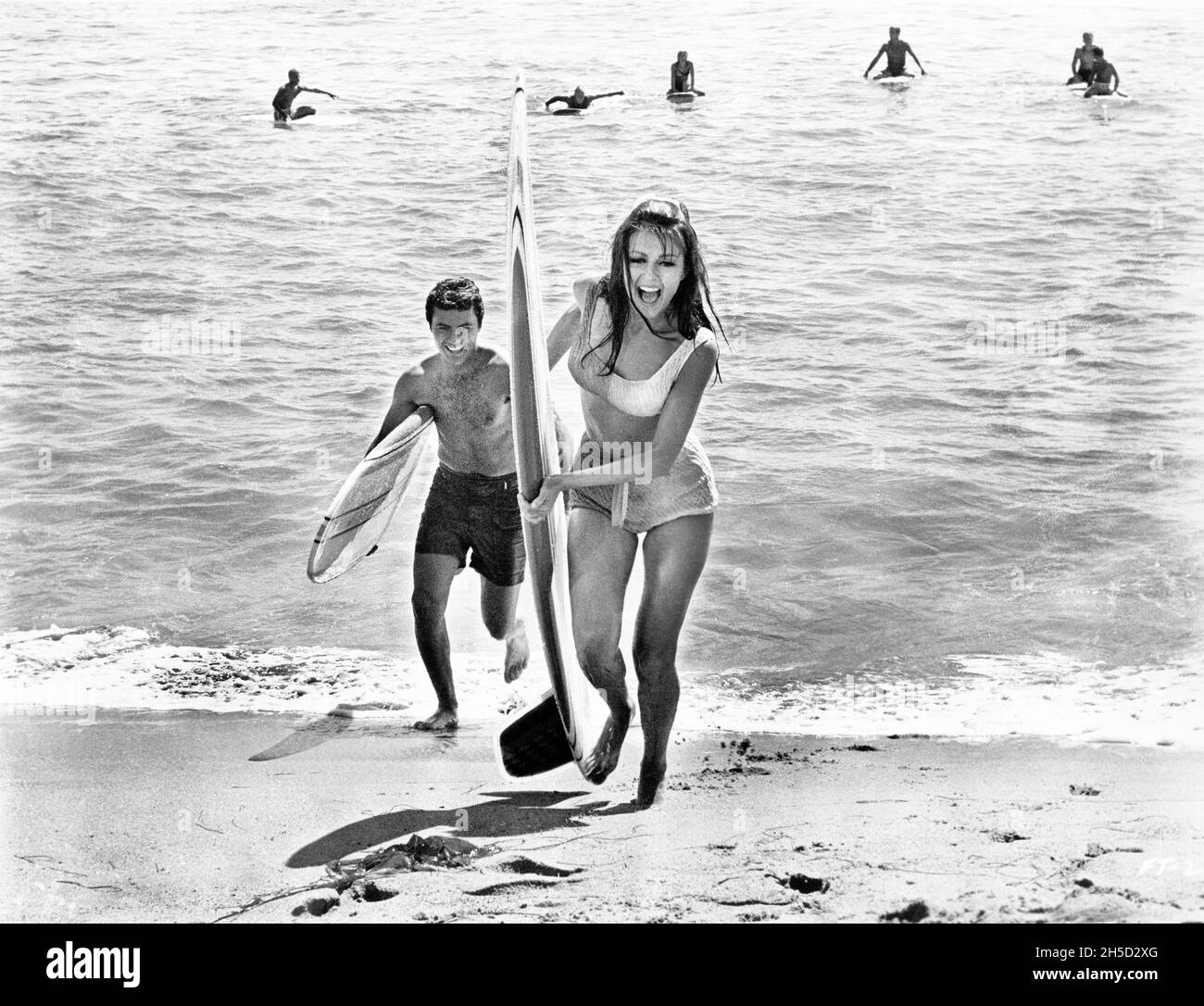 James Darren, Pamela Tiffin, on-set of the Film, 'For Those Who Think Young', United Artists, 1964 Stock Photo