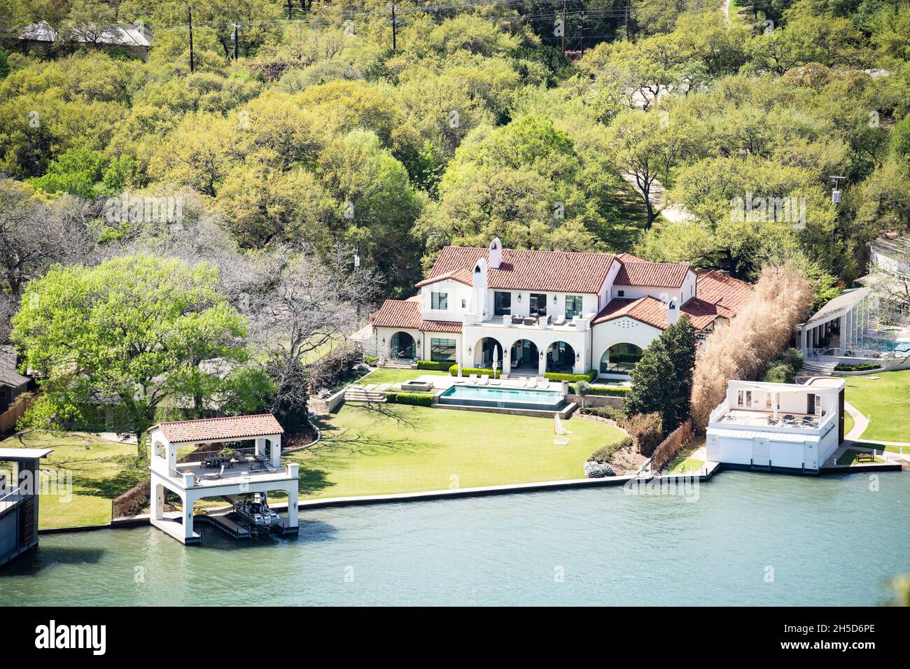 Colorado River in Austin Texas with Big Houses on the Waterfront and