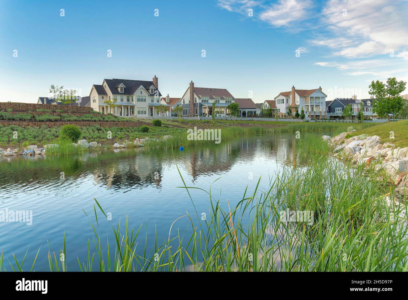 Oquirrh Lake with a reflection of the residential houses at Daybreak