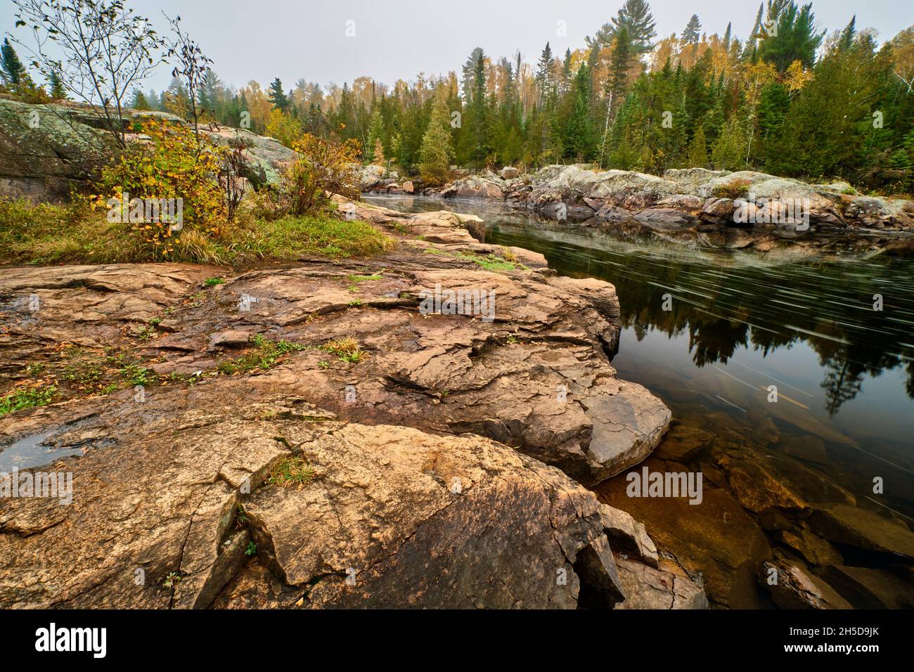 Slow shutterspeed photograph of a river in the Cascades Conservation Area near Thunder Bay Ontario. Stock Photo