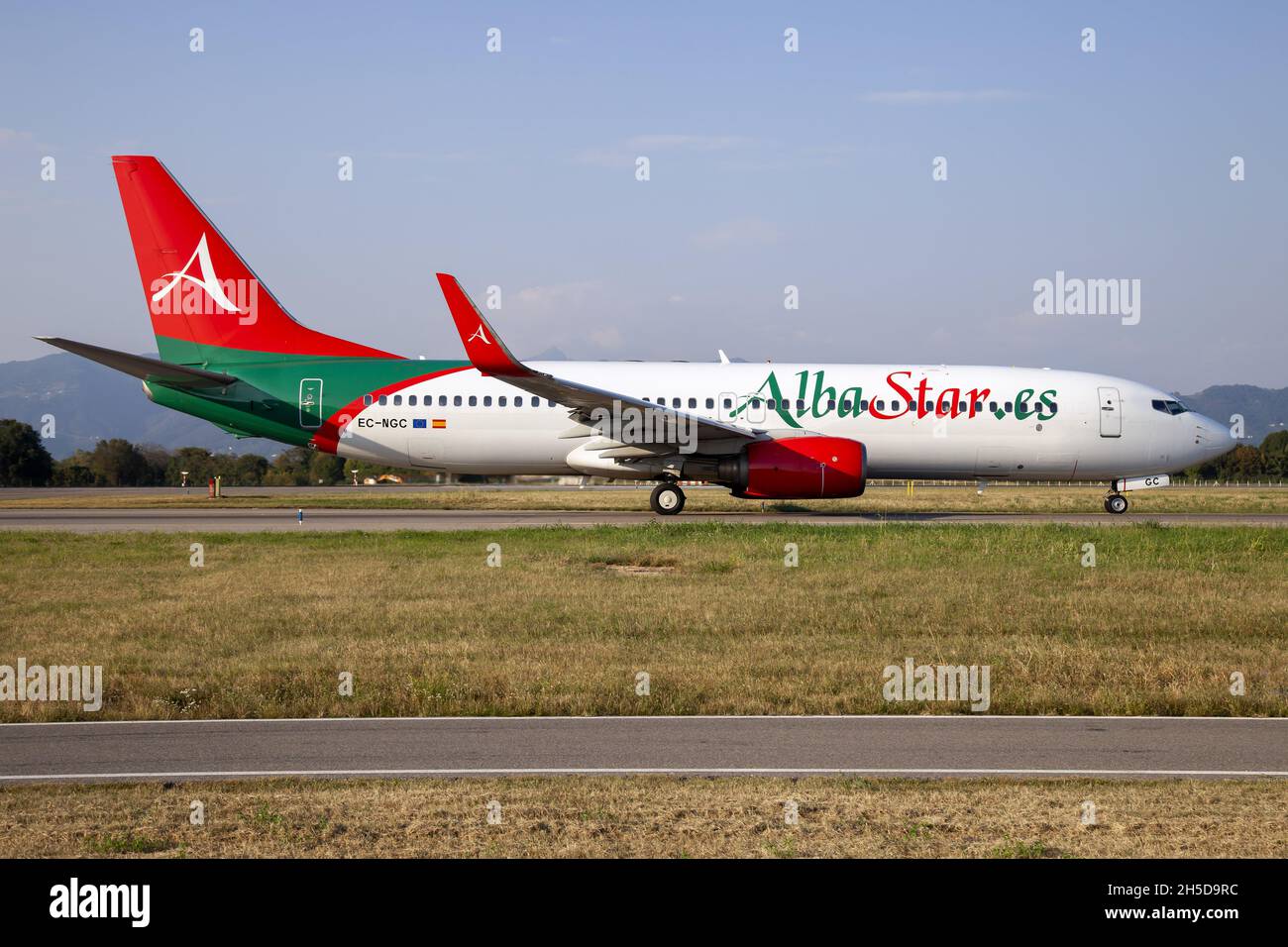 An AlbaStar Boeing 737-800 leaving Milan Bergamo airport. Stock Photo