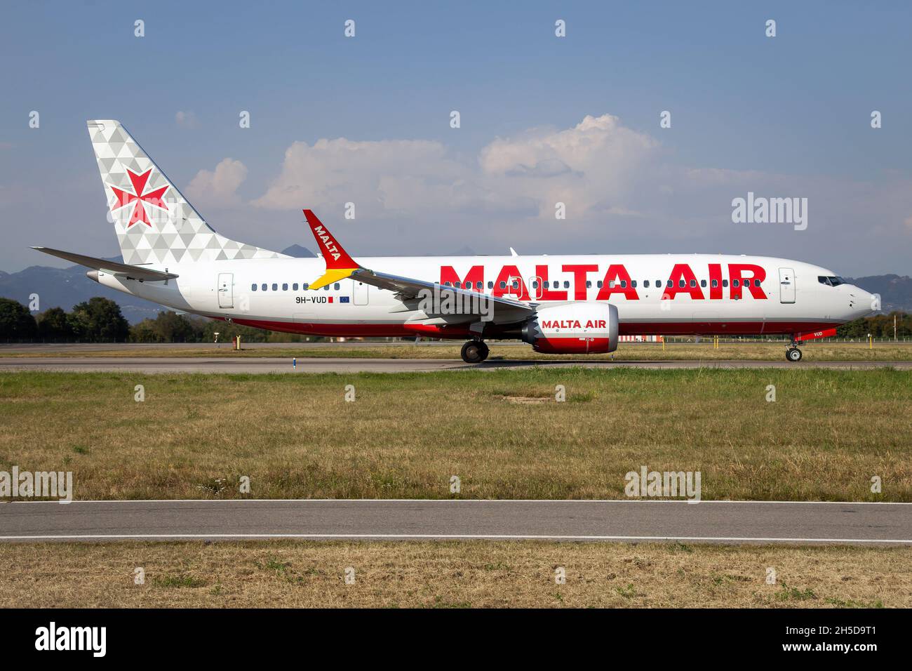 A Malta Air Boeing 737-8-200 MAX leaving Milan Bergamo airport. Stock Photo