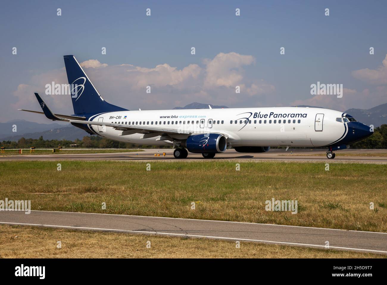 A Blue Panorama Airlines Boeing 737-800 leaving Milan Bergamo airport.  Blu Panorama suspended its operations in October 2021. Stock Photo