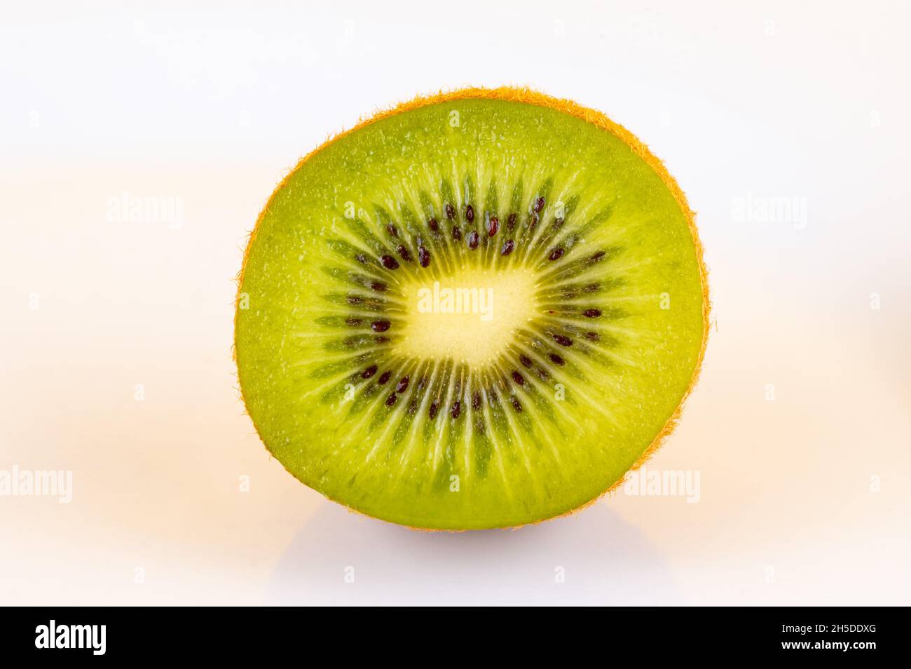 Cut kiwi isolated on white background Stock Photo Alamy