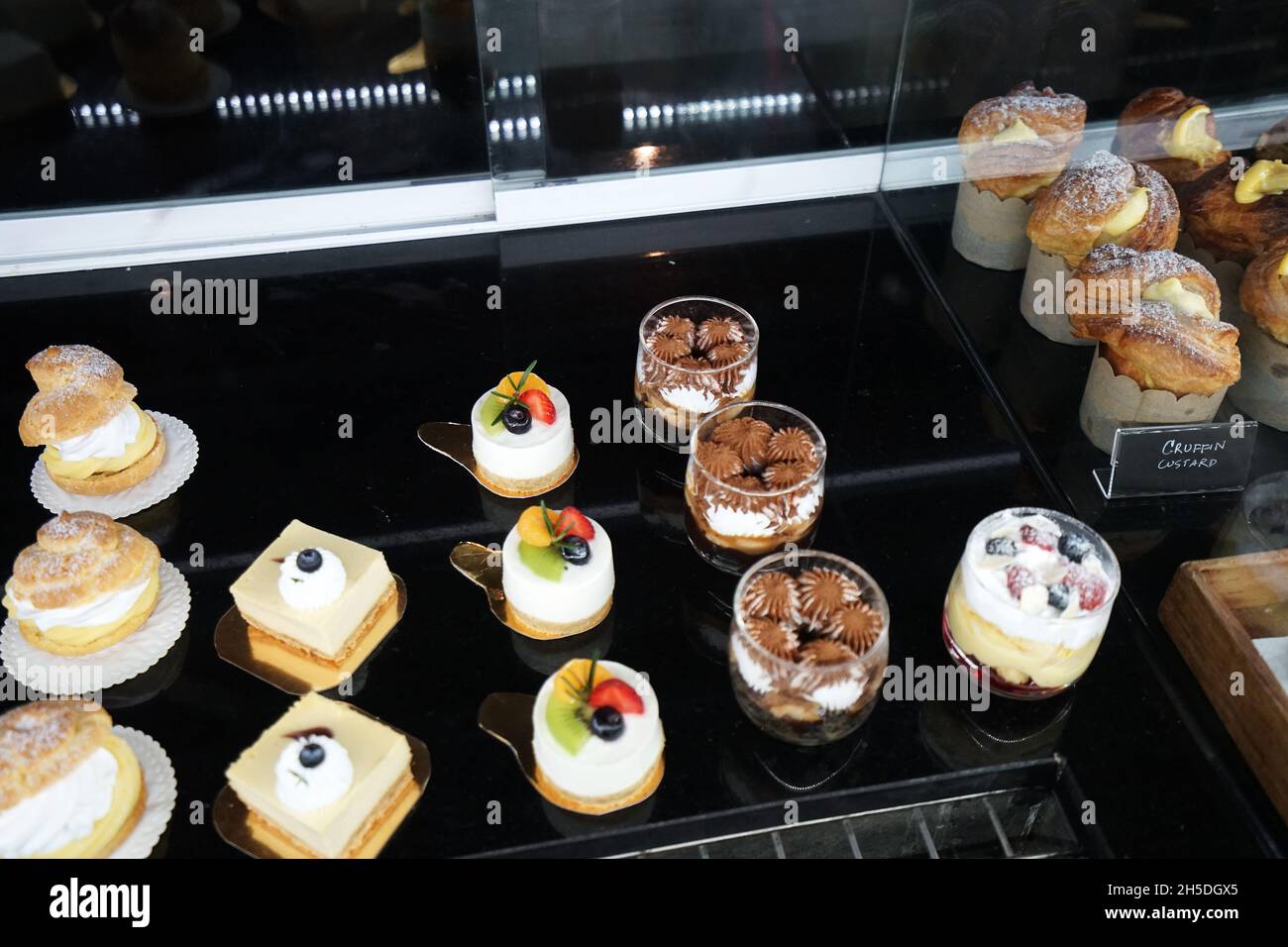 Assorted cake pastry and desserts displayed in case box Stock Photo Alamy