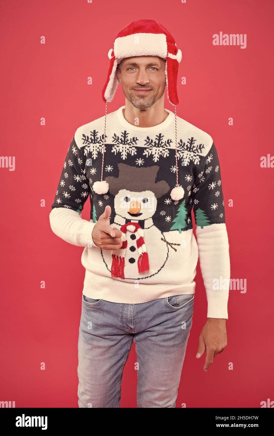 man in sweater and hat wish happy new year and merry christmas holiday ...