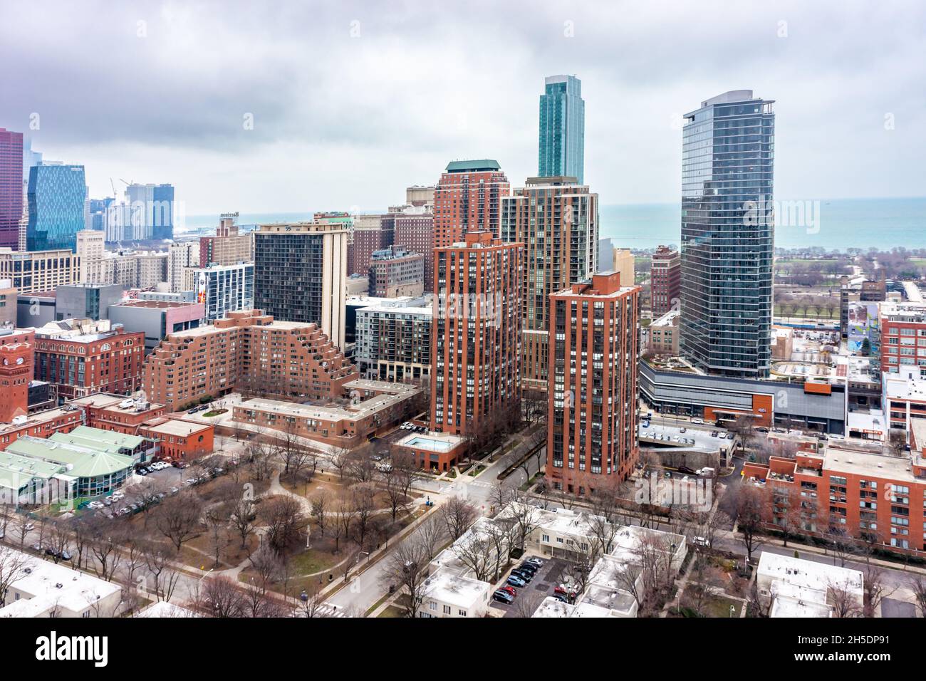 Ariel city view in Chicago of nondescript buildings near Lake Michigaan, showing an overcast Moody sky. Stock Photo