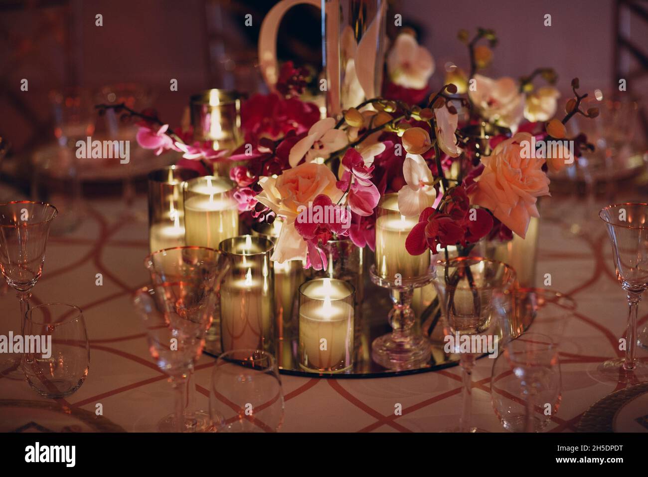 Wedding decor table with white flowers and candles Stock Photo - Alamy