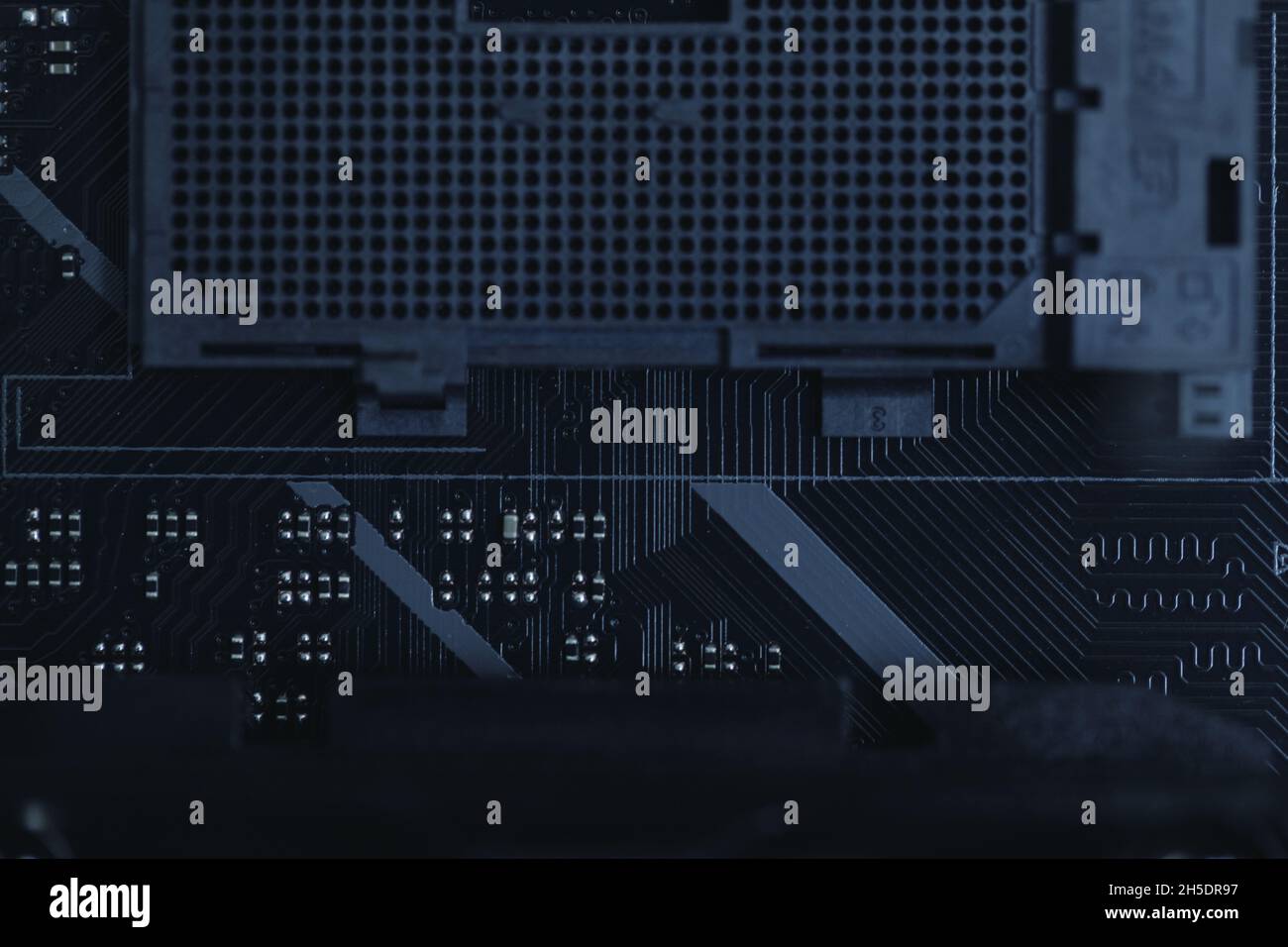 Close up of modern computer processor. Abstract digital data background. Electronic computer hardware technology. Stock Photo