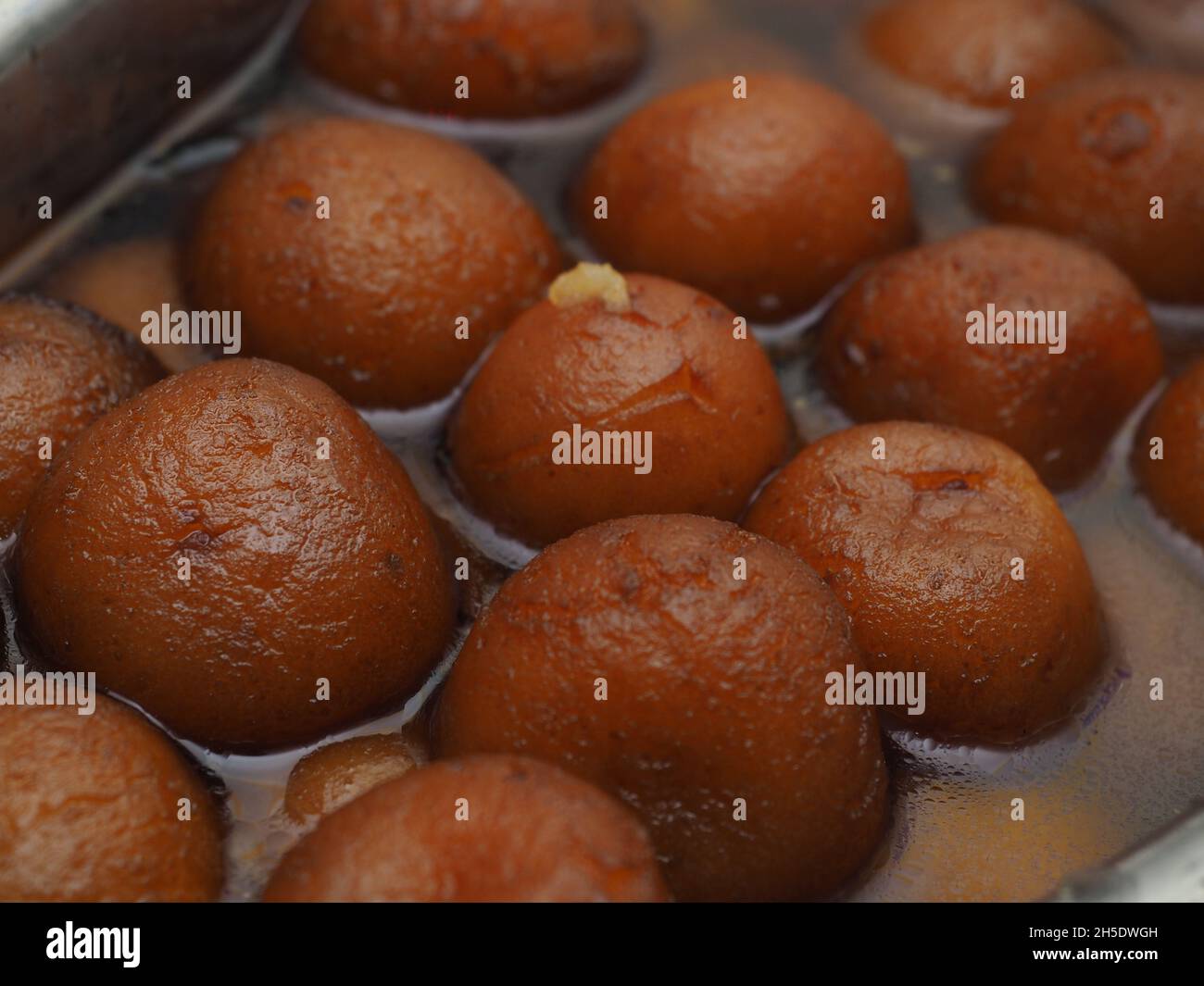 Indian Sweet Gulab Jamun is a Syrupy Dessert Popular in India Stock