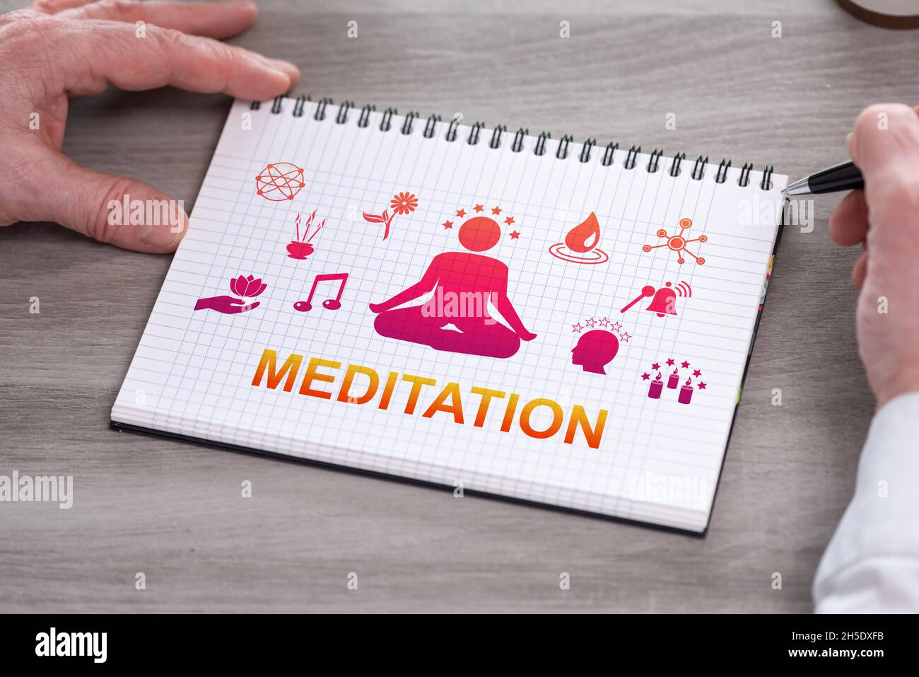 Hand holding a notepad with meditation concept Stock Photo - Alamy