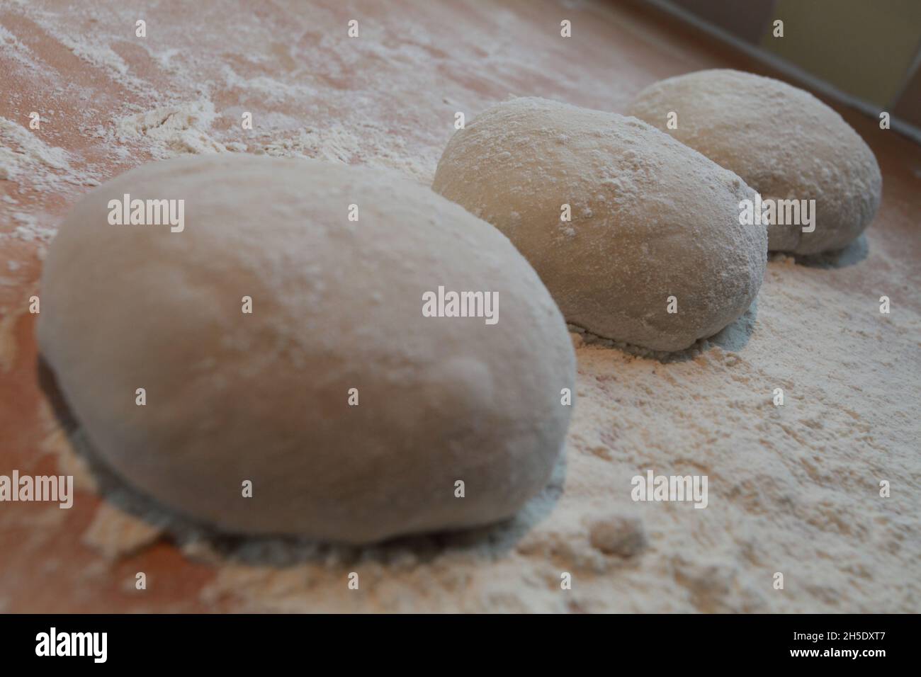 bread rolls proving and resting Stock Photo Alamy