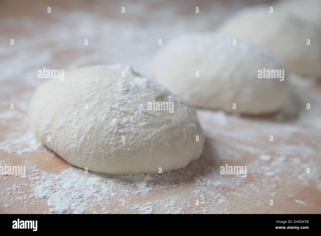 bread rolls proving and resting Stock Photo Alamy