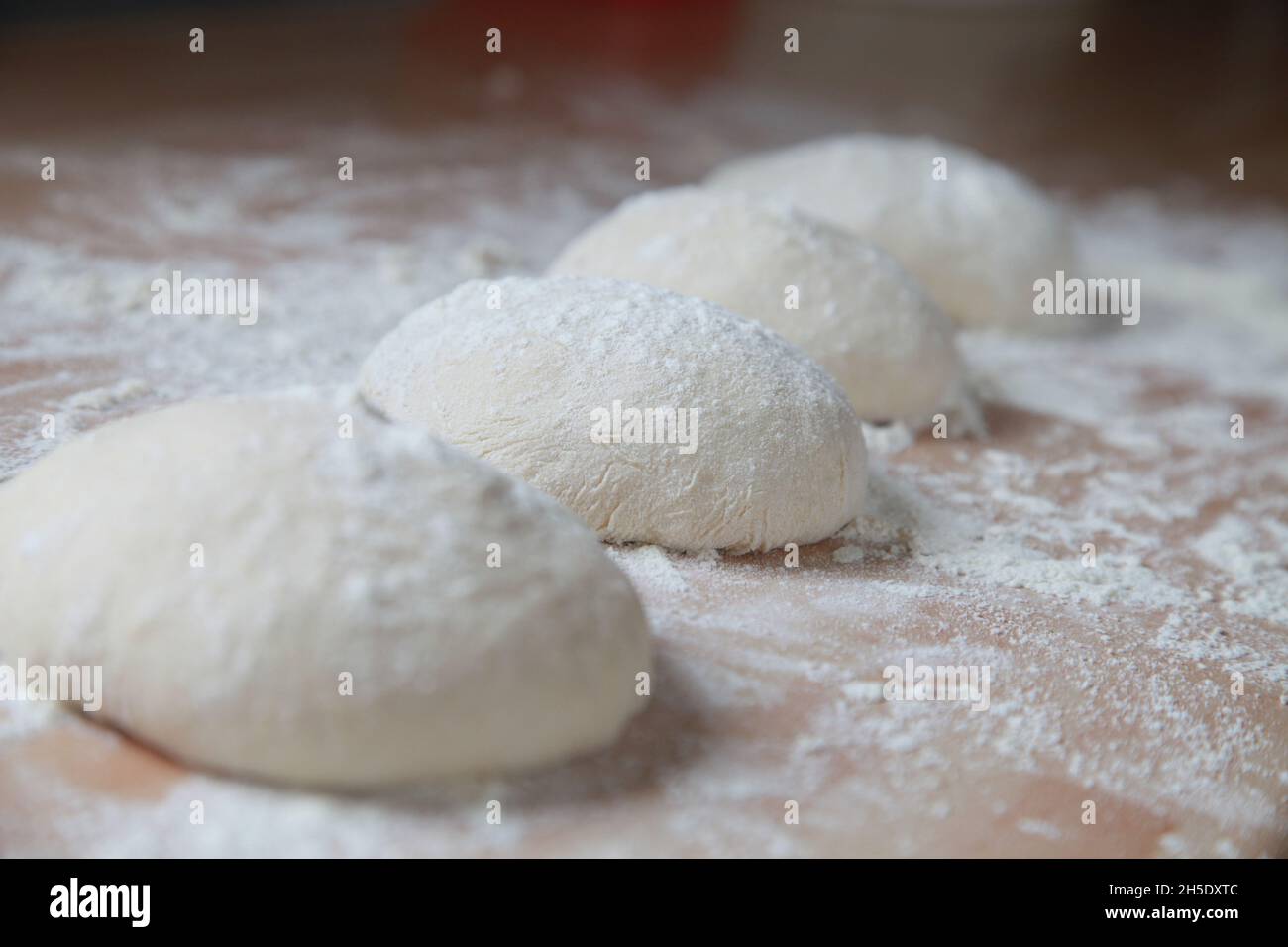bread rolls proving and resting Stock Photo Alamy