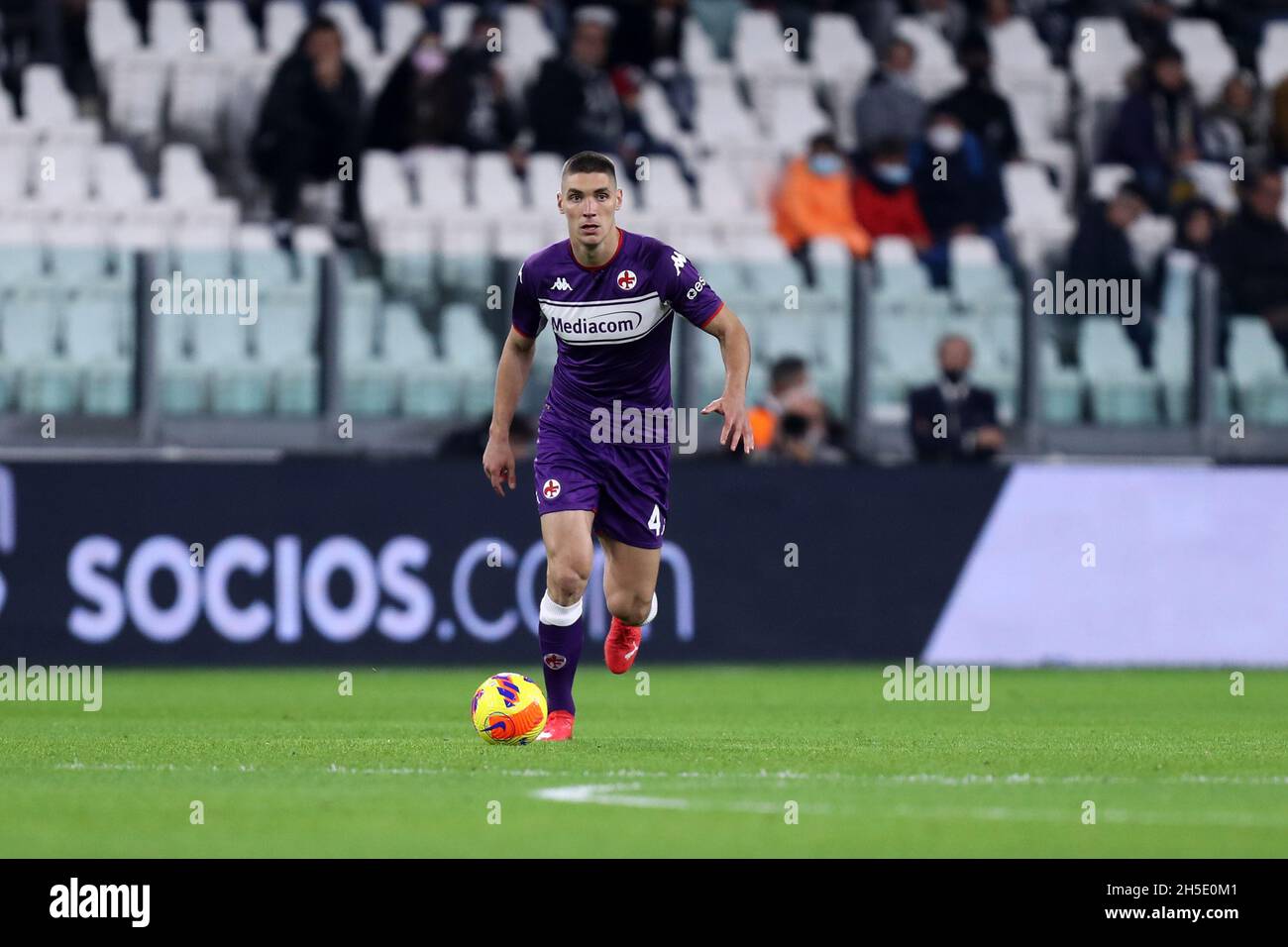 Florence, Italy. 21st May, 2022. Moise Kean of Juventus FC and Nikola  Milenkovic of ACF Fiorentina compete for the ball during the Serie A  2021/2022 football match between ACF Fiorentina and Juventus