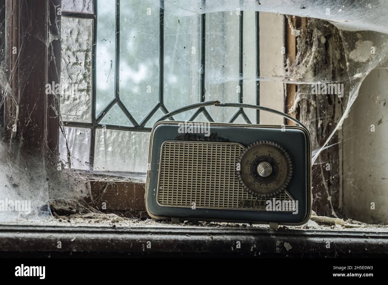 old radio on window board in house Stock Photo - Alamy