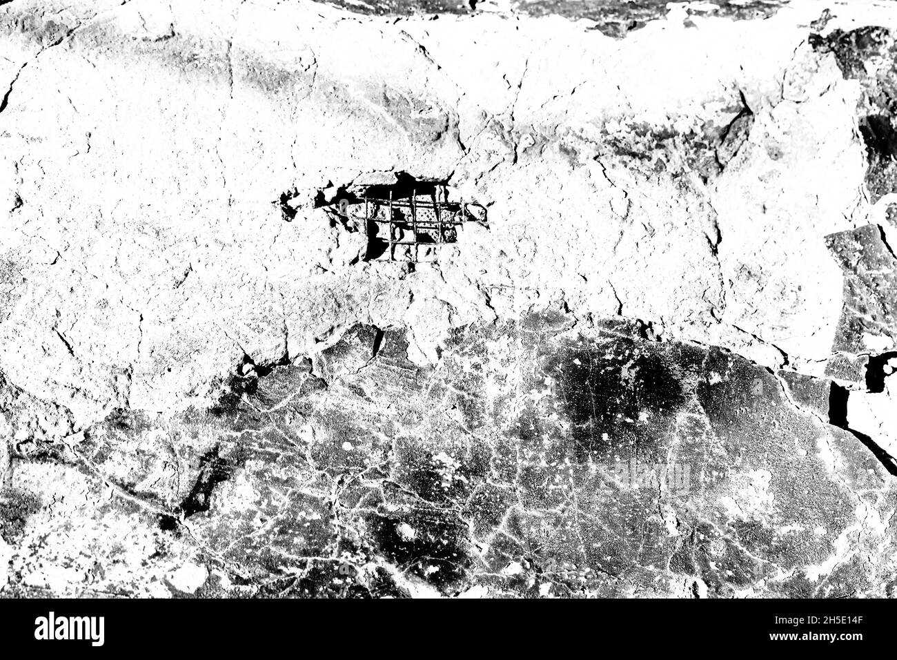 Black and white texture, broken concrete surface with cracks and chips ...