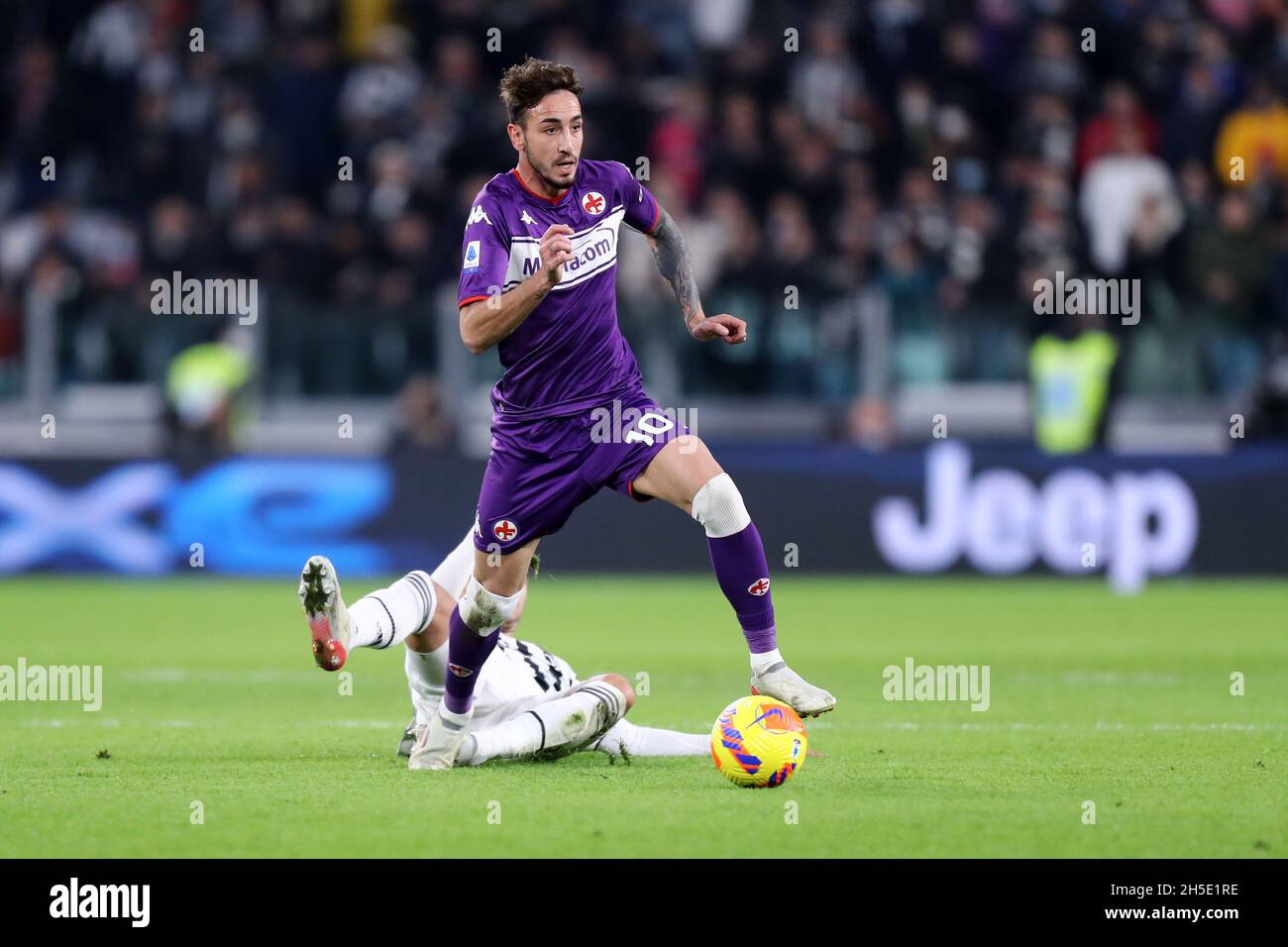 Christian Kouame of ACF Fiorentina and Alex Sandro of Juventus FC compete  for the ball during the Serie A football match between Juventus FC and ACF  Stock Photo - Alamy