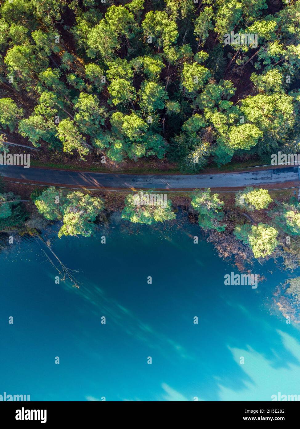 Clear and turquoise lake near Trakai, Lithuania Stock Photo