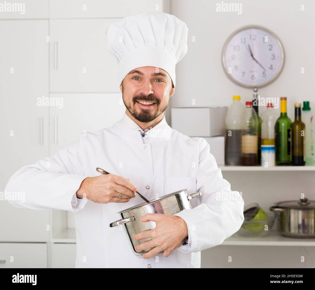 Smiling male cook checking hi-res stock photography and images - Alamy