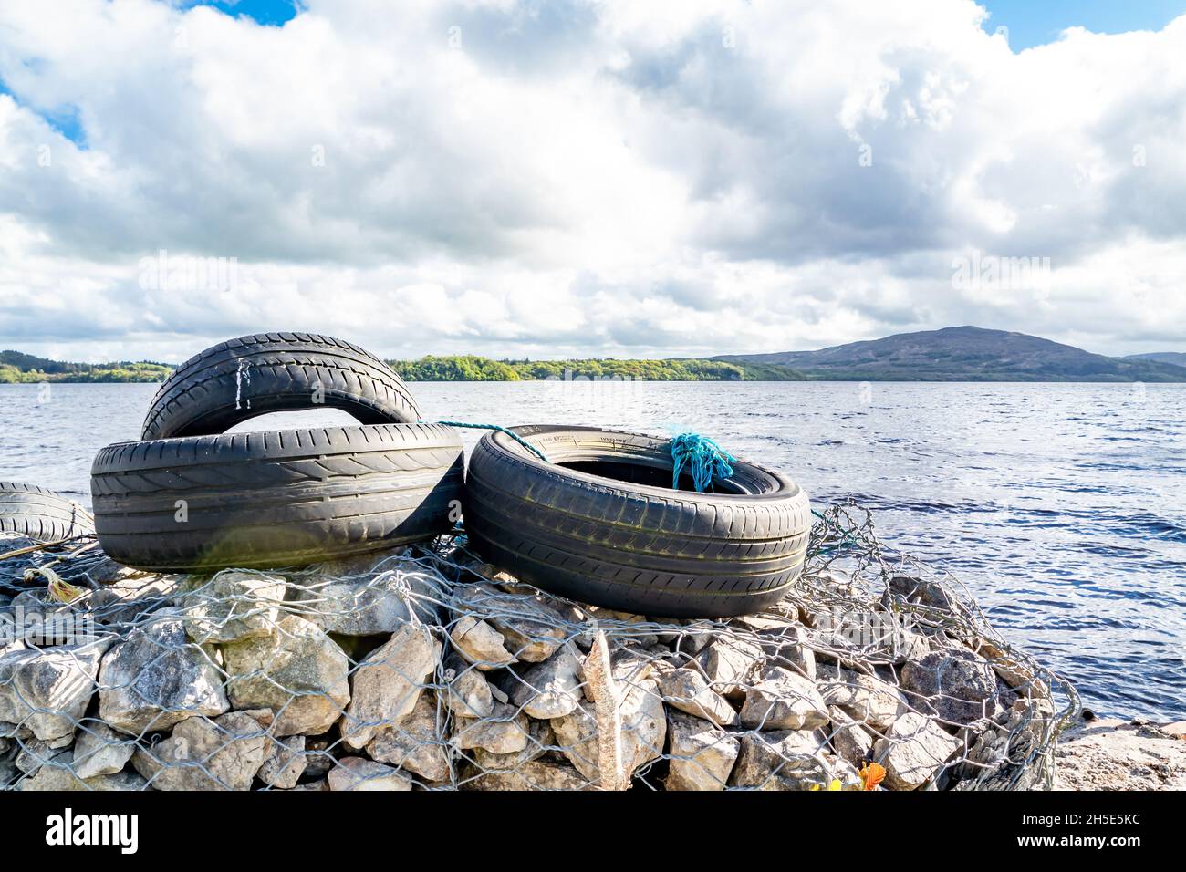 Rubber car tires on a pier in County Leitrim Ireland Stock Photo Alamy