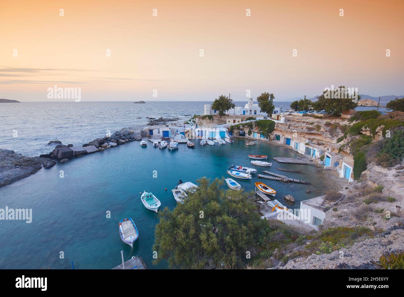 The picturesque fishing village of Mandrakia at sunset, Milos, Greece Stock Photo