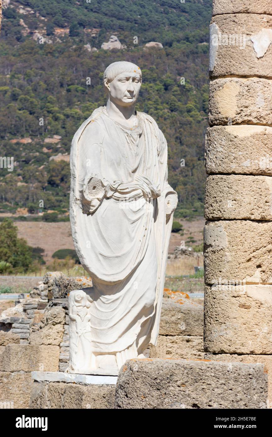 Statue of the Emperor Trajan in the Basilica beside the Forum at the ruins of the Roman town of Baelo Claudia, Tarifa, Bolonia, Andalusia, southern Sp Stock Photo