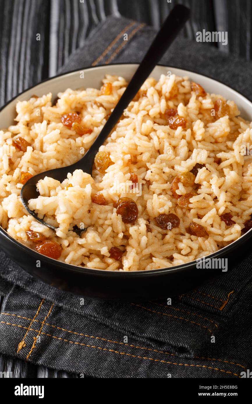 Authentic Colombian Arroz Con Coco Coconut Rice is a classic dish native to the Carribean coastal regions of Colombia close up in the bowl on the tabl Stock Photo
