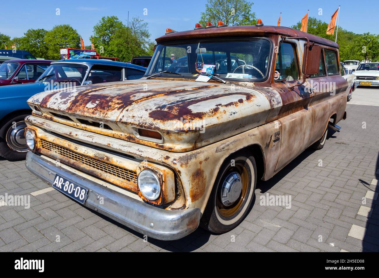 1966 Chevrolet Suburban C10 classic car on the parking lot. Rosmalen, The Netherlands - May 8, 2016 Stock Photo