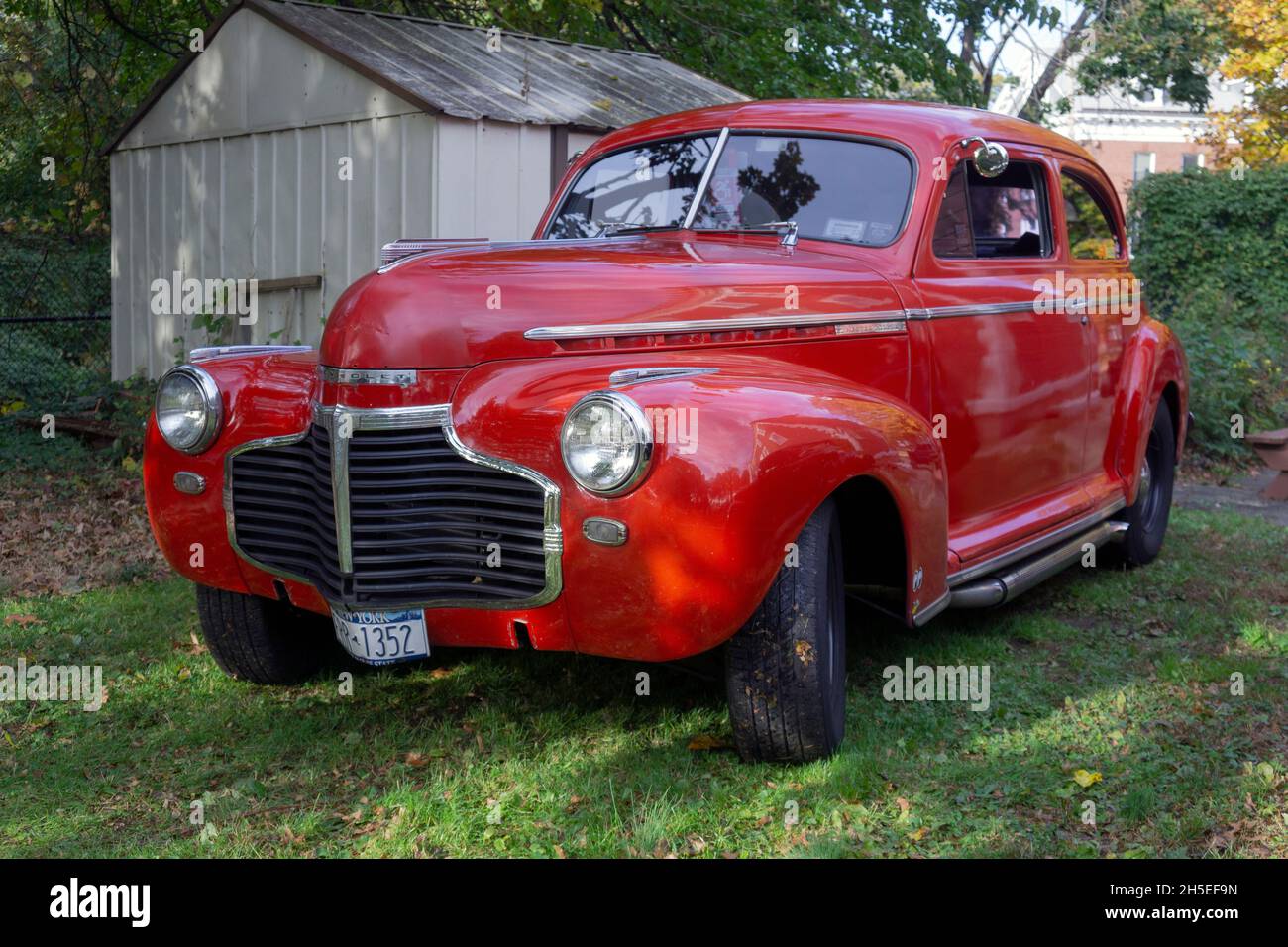 An antique 1941 Chevrolet 2 door sedan parked outside the Bayside Historical Society in Queens at a vintage car show. Stock Photo