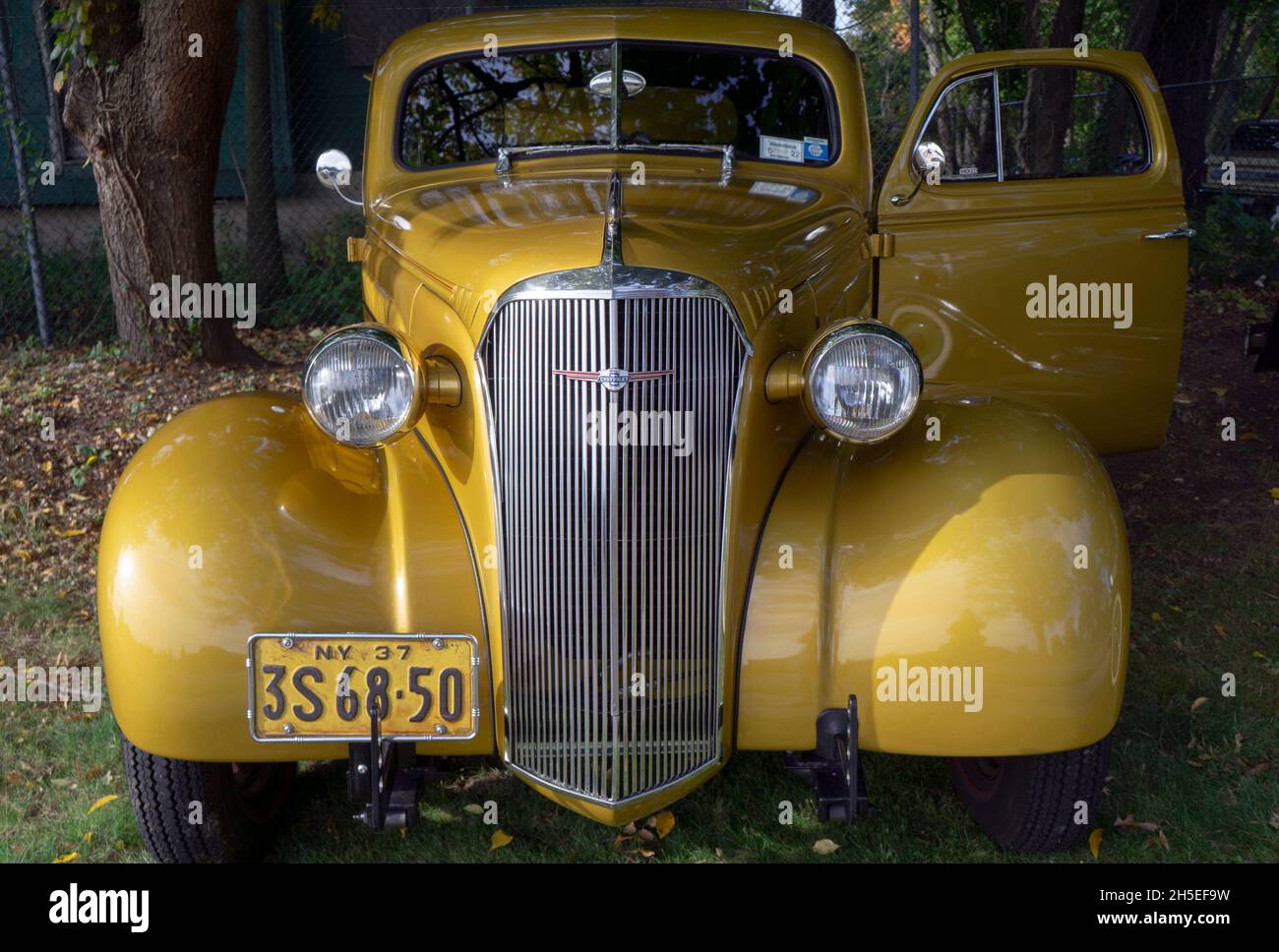 An antique 1937 Chevrolet 2 door sedan parked outside the Bayside Historical Society in Queens at a vintage car show. Stock Photo