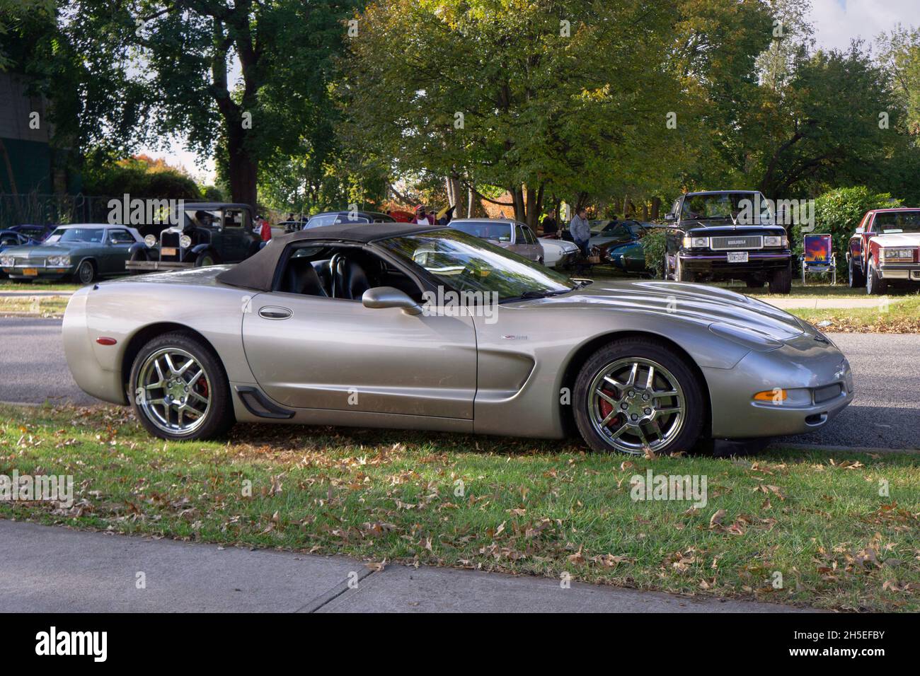 A silver 2002 Corvette convertible parked outside the Bayside Historical Society in Queens at a vintage car show. Stock Photo