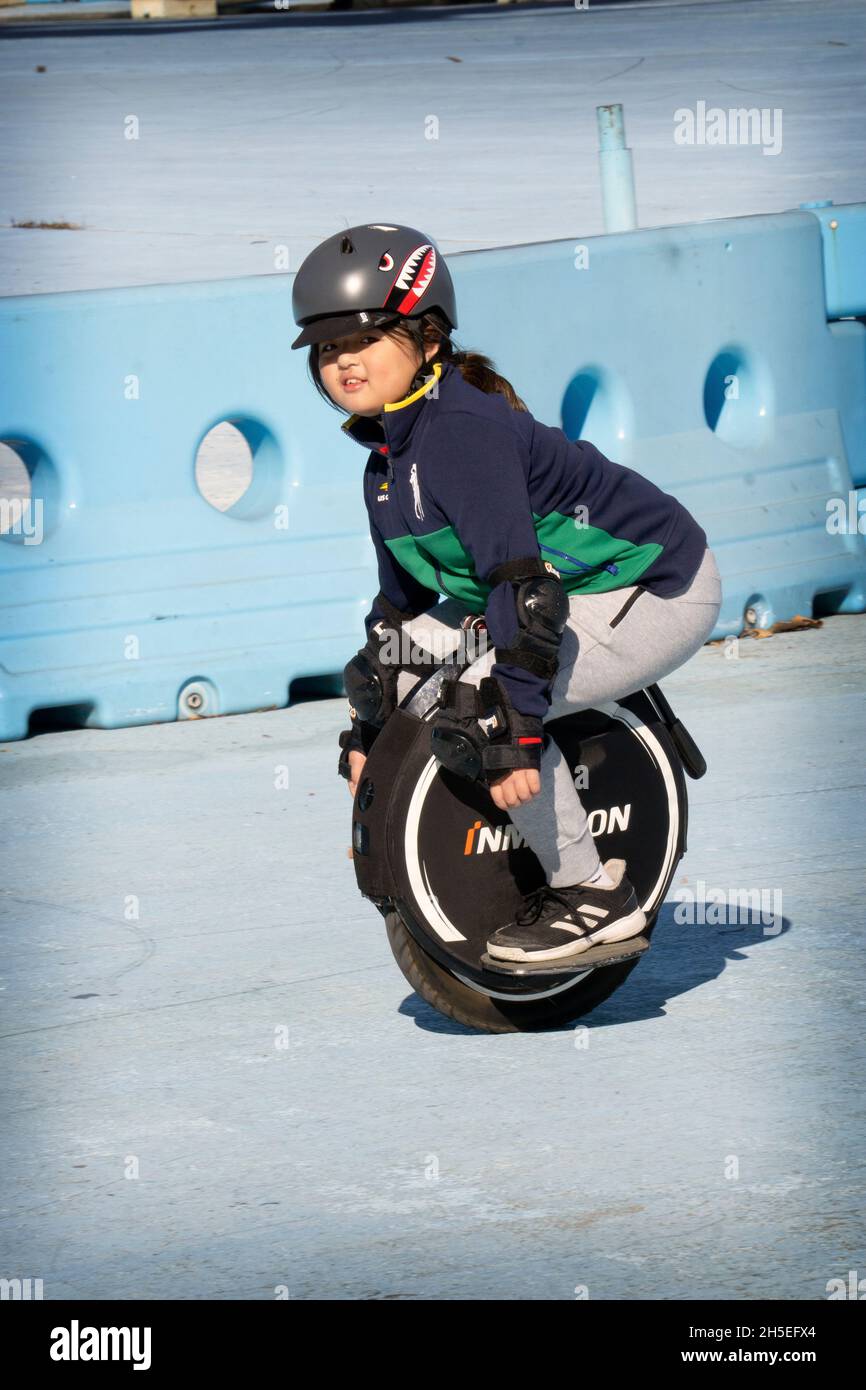Teenage girl on unicycle hires stock photography and images Alamy