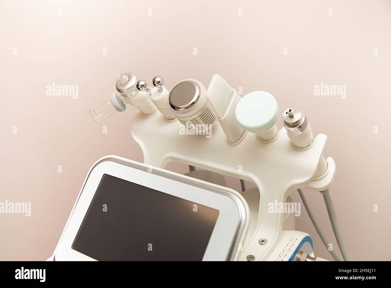 Attachments to device HydraFacial facial skin care machine in spa clinic for anti-aging or acne treatment. concept of aesthetic medicine, self-care Stock Photo